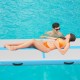 Inflatable 15 feet gymnastics tumbling mat in use on water, ideal for exercise and water yoga, featuring durable PVC.