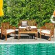 4-piece outdoor acacia wood sofa set with soft cushions, perfect for patio or poolside relaxation.