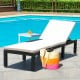 Side angle of a cushioned height adjustable rattan lounge chair by the pool, perfect for outdoor leisure and sunbathing.
