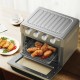 19 Qt convection air fryer toaster oven with chicken wings, featuring 7 cooking functions and a transparent window.