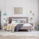 Set of 2 white accent side tables with curved legs and lower shelf, perfect for living room decor and storage.