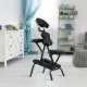 Foldable PU leather massage chair with adjustable face cradle and armrest, ideal for travel and easy storage.