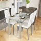5-piece dining set featuring a clear glass table and 4 white PVC leather chairs, perfect for modern dining spaces.