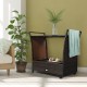 Patio rattan bar serving cart with glass top, removable ice bucket, and wheels for easy movement in outdoor spaces.