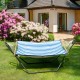 Heavy-duty steel hammock frame with adjustable chains, set in a garden surrounded by blooming flowers for outdoor.