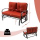 Brick red cushioned patio glider loveseat with ergonomic armrests, sturdy steel frame, ideal for outdoor relaxation.