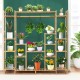 9-tier bamboo plant stand with hanging rack, featuring hollowed shelves for drainage, ideal for indoor and outdoor.