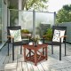 Two outdoor patio wicker dining chairs with ergonomic armrests and a rustic acacia wood table for stylish relaxation.