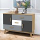 Front view of the free-standing storage cabinet featuring a stylish mix of colors, two doors, and three drawers for.