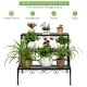 Three-tier metal decorative plant stand with elegant design, ideal for indoor and outdoor plant display and storage.