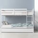 Full over full bunk bed in white wood with trundle, featuring sturdy slats and guardrails, perfect for kids' rooms.