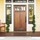 Artificial spiral boxwood topiary in golden pot, 4 feet tall, perfect for indoor or outdoor decor, UV and water.