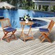 Folding wooden bistro set with cushioned navy chairs and round table, perfect for outdoor relaxation by the pool.
