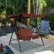 Cushioned loveseat patio swing glider with black steel frame and canopy, perfect for outdoor relaxation in garden or.