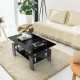 Rectangular tempered glass coffee table with gray MDF legs, showcasing a glossy surface and rounded corners for safety.