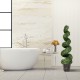 Artificial boxwood spiral tree with green leaves in a stylish indoor setting, perfect for decoration and easy care.
