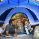 Family enjoying time inside the 2-in-1 4 Person Instant Pop-up Waterproof Camping Tent in blue, perfect for outdoor.
