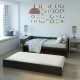 Twin size trundle bed frame in dark brown shown with mattress, perfect for stylish and multifunctional space-saving.