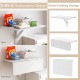 Wall-mounted drop-leaf table in sleek white finish, shown in open position for dining or workspace, ideal for small.