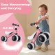 Baby balance bike in pink with 4 wheels, lightweight at 3.5 lbs, designed for toddlers' safety and motor skills.