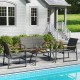 4-piece outdoor conversation patio furniture set in gray, featuring a loveseat, two armchairs, and a coffee table by.