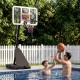 Portable basketball hoop adjustable from 4.9-10 feet, with a fillable base, perfect for poolside fun and training.