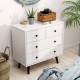 White 4-drawer dresser chest with black knobs, perfect for storage and matching various decor styles in any room.