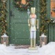 4 FT Christmas nutcracker with a golden hat and scepter, ideal for festive indoor or outdoor holiday displays.