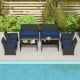 Patio furniture set featuring a tempered glass tabletop, navy cushions, and waterproof rattan for outdoor relaxation.