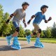 Kids wearing blue adjustable inline skates with light-up wheels, enjoying outdoor skating in a park.