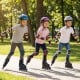 Youth roller skates with adjustable sizes and light-up wheels, designed for safety and comfort during outdoor skating.