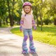 Kids roller skates in purple with light-up wheels, adjustable sizes, and safety gear for outdoor fun.