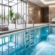 4-step stainless steel swimming pool ladder with anti-skid steps and curved handrails for indoor and outdoor pools.