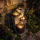 4-tier cascading bowl outdoor water fountain with LED lights, featuring realistic gray stone and rustic brown bowls for.