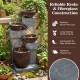 4-tier cascading bowl outdoor water fountain in gray stone and rustic brown, featuring LED lights for a calming.