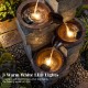 4-tier cascading bowl outdoor water fountain with 3 warm white LED lights for a calming ambiance and natural beauty.