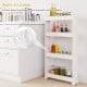 4-tier slim storage trolley in white with detachable trays and built-in holes for ventilation, ideal for kitchen.