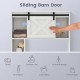 4-tier over the toilet storage cabinet with a sliding barn door, ideal for organizing towels and toiletries in the.