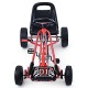 Kids ride-on pedal-powered go-kart in red with ergonomic seat, four wheels, and wear-resistant rubber tires for outdoor.