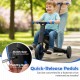 Toddler riding on a 4-in-1 foldable tricycle with push handle, featuring quick-release pedals and adjustable seat.