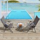 Two gray aluminum folding dining chairs with adjustable backs, perfect for poolside relaxation or outdoor dining.