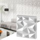 3D wall panels in white PVC with diamond accents, ideal for DIY home decoration in living rooms or bedrooms.