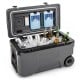 Portable 53 quart gray rolling cooler with ice bags, cup holders, and fish ruler, ideal for camping and outdoor activities.