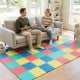 Multicolor EVA foam floor tiles provide non-slip comfort and protection, ideal for home gyms and living rooms.
