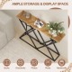 Console table featuring a solid wood top and geometric metal base, ideal for displaying plants and ornaments in any.