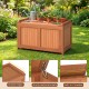 52-gallon patio wood deck box with flip top, ideal for cushions and garden tools, shown in a garden setting.