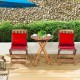 Folding wooden bistro set with red cushioned chairs and round table, perfect for outdoor relaxation and convenience.