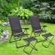 Two gray adjustable folding patio chairs with matching ottoman set in a garden, perfect for outdoor relaxation.
