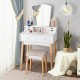 Makeup vanity set with 6 drawers, unique shape mirror, and solid stool, perfect for cosmetics and home decor.