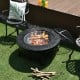 Outdoor fire pit with BBQ grill, high-temp finish, mesh cover, and poker, perfect for backyard gatherings.